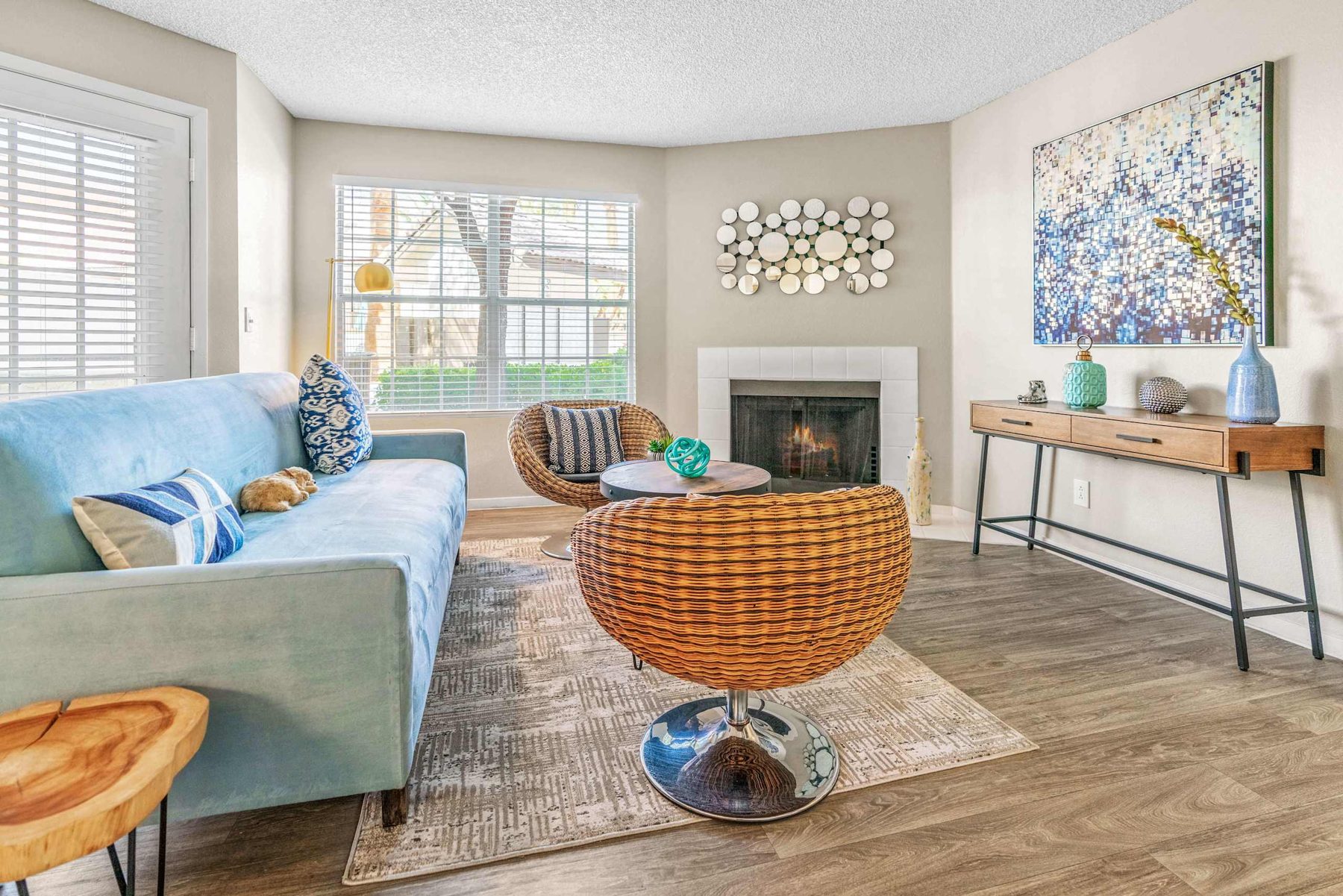 Old Town Terrace living room with blue sofa and fireplace